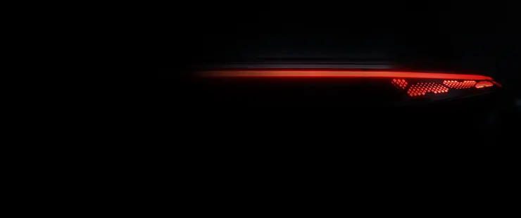 Abstract of rear taillight on black background