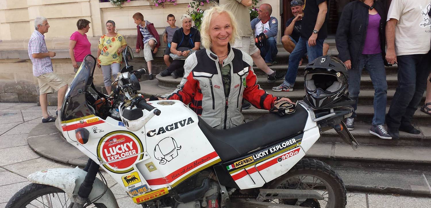 Rebecca Kleis posing with motorcycle