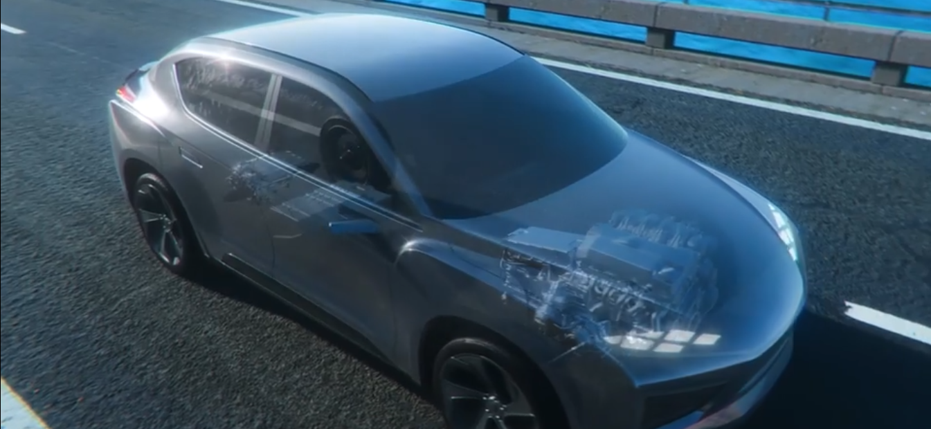 Futuristic semi-transparent car showing internal engine components on a road