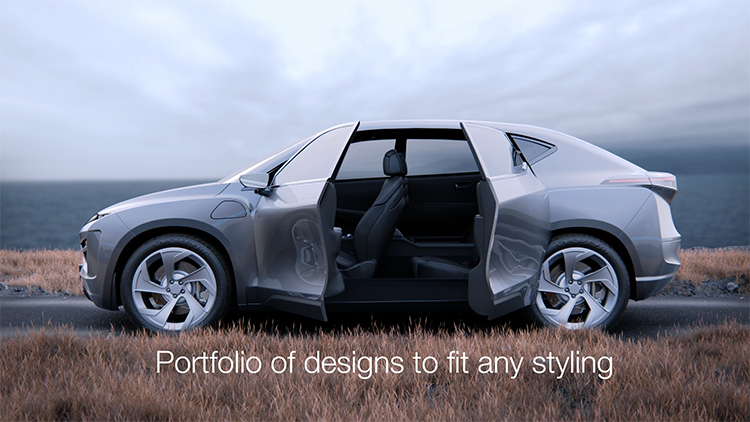 Grey vehicle on a road with the ocean in the background showing how SmartAccess Power Doors work