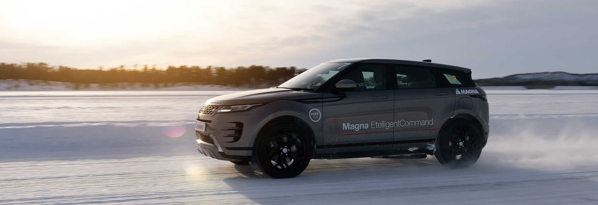 Magna EtelligentCommand vehicle driving along a snowy road